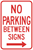 No Parking Between Signs with Right Arrow